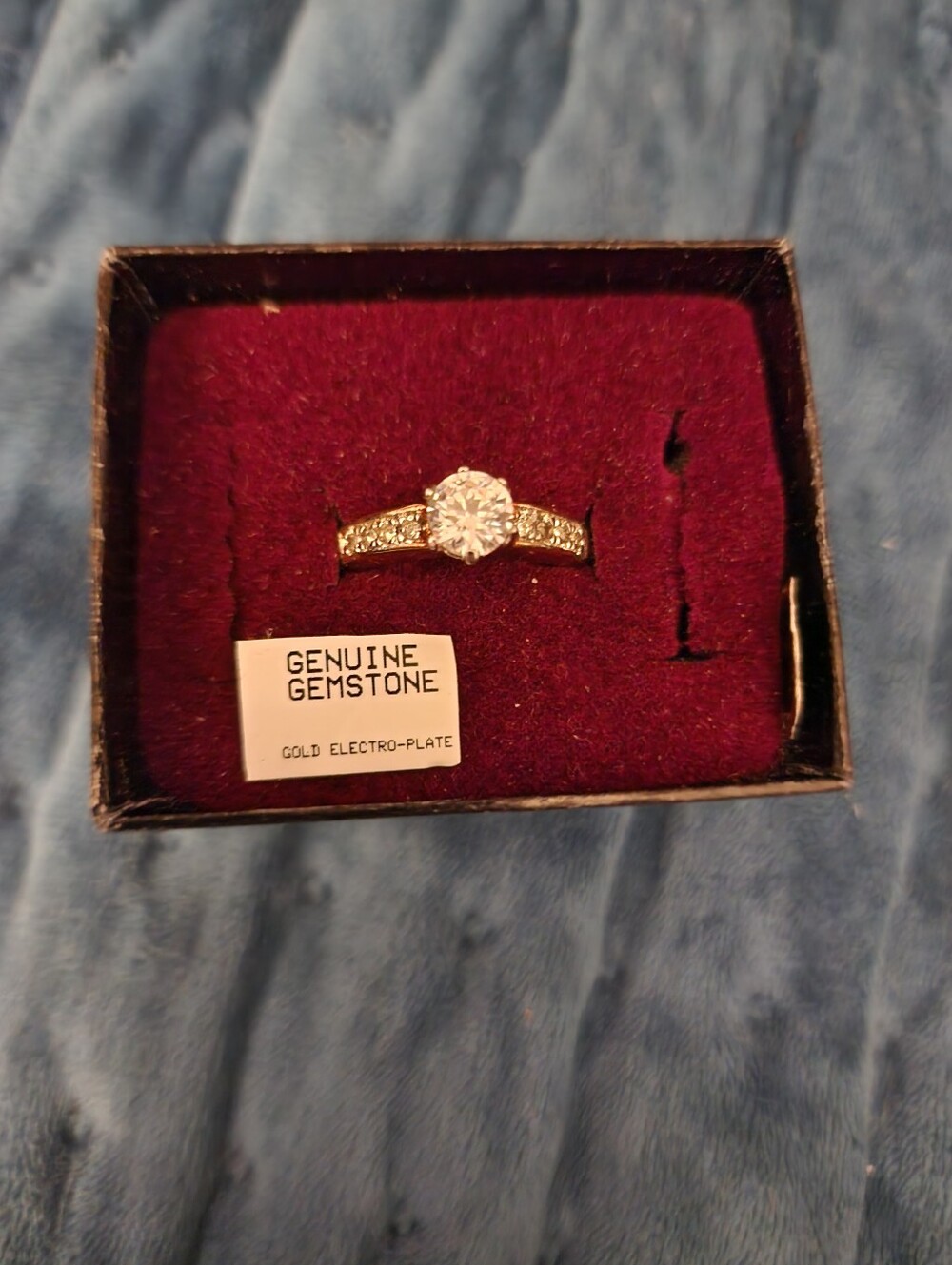 Gold-Tone Solitaire Ring with Clear Gemstone